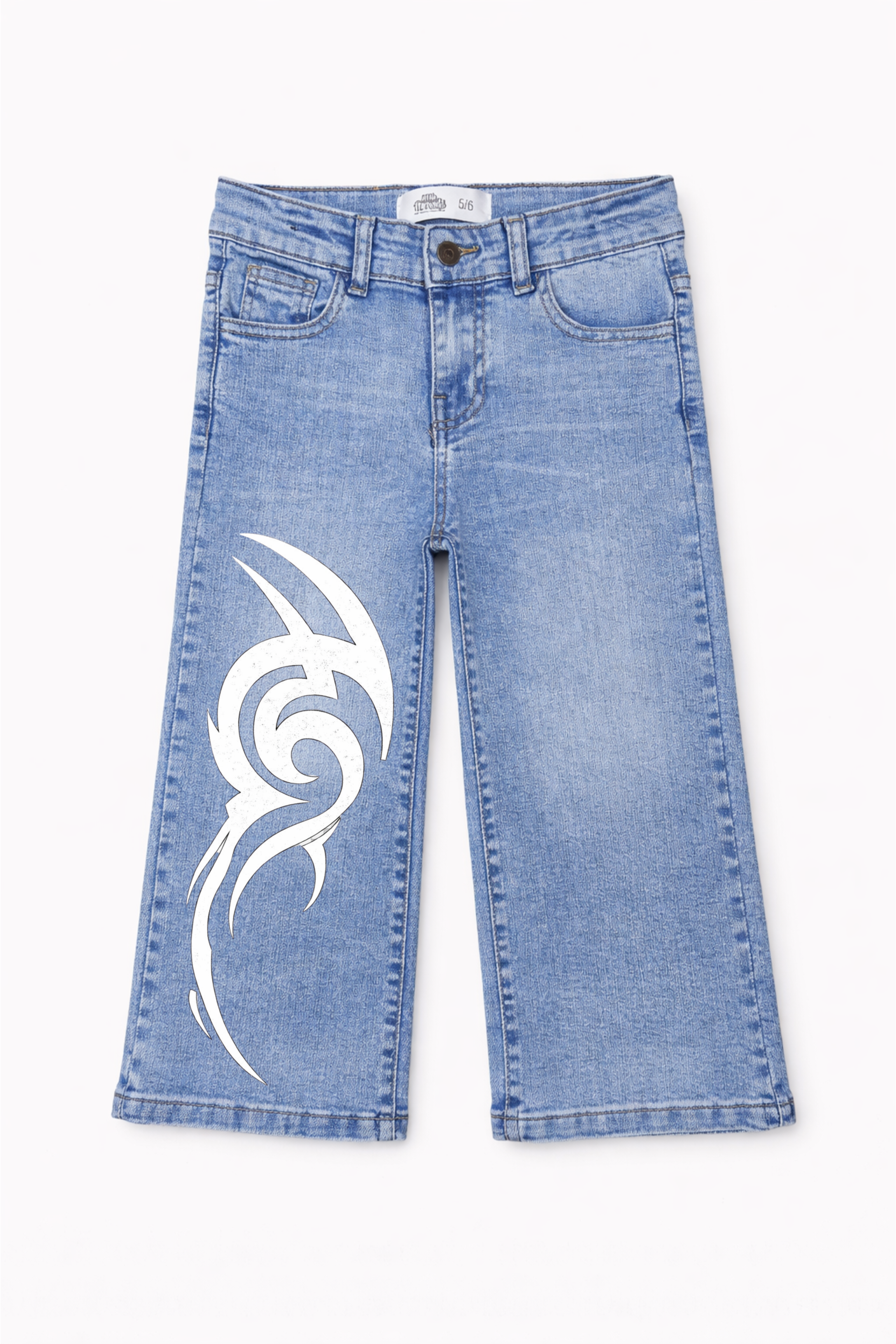 Blue jeans with a white tribal design on a white background