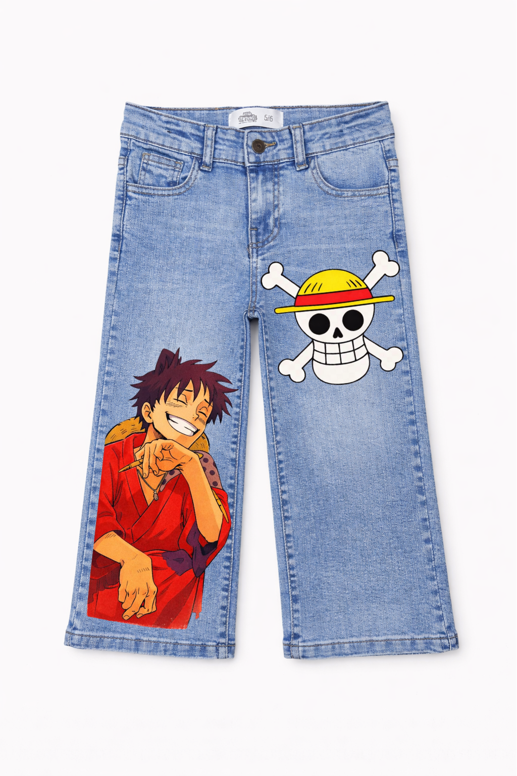 Blue jeans with a character and skull design on a white background