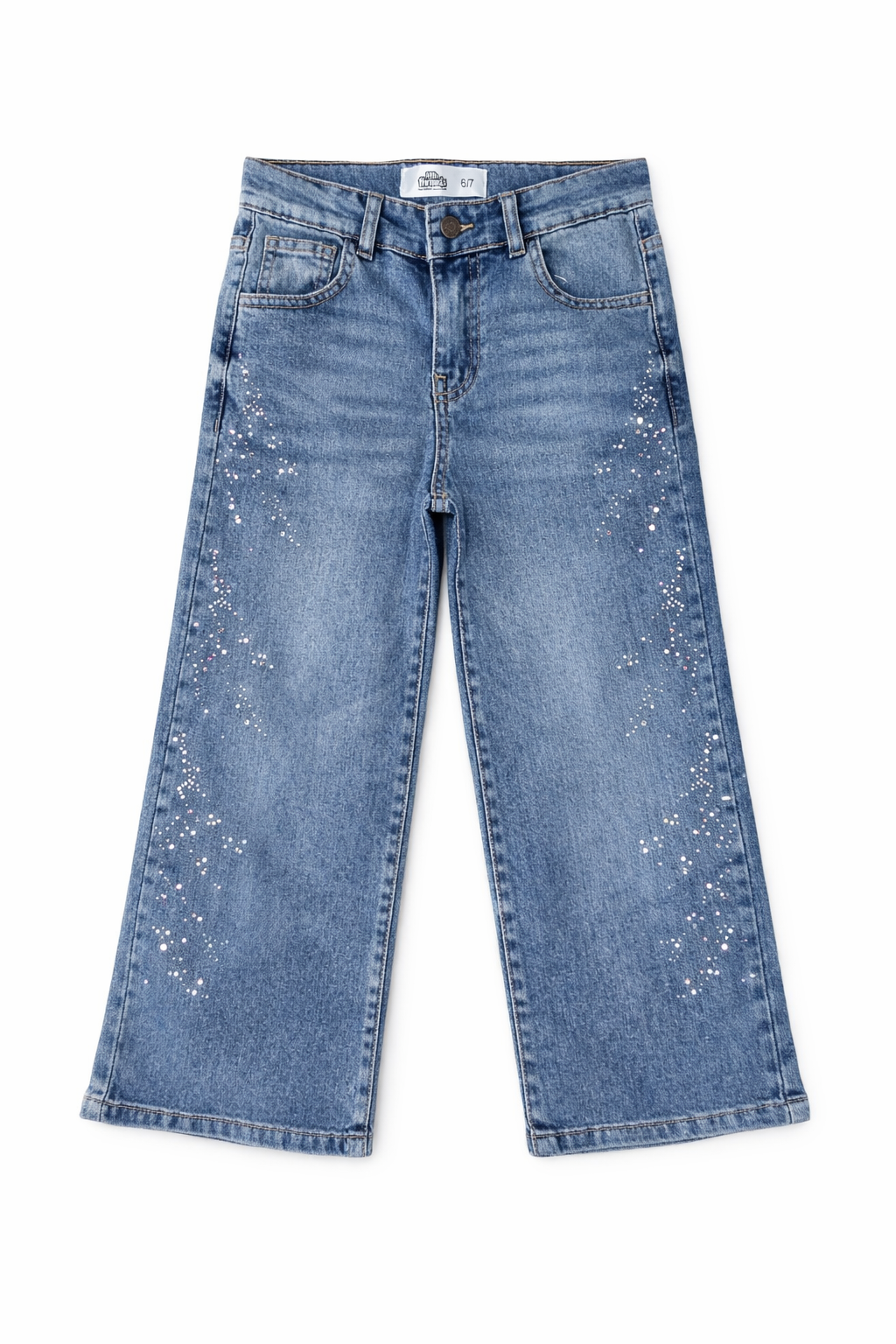 Blue jeans with white speckles on a white background