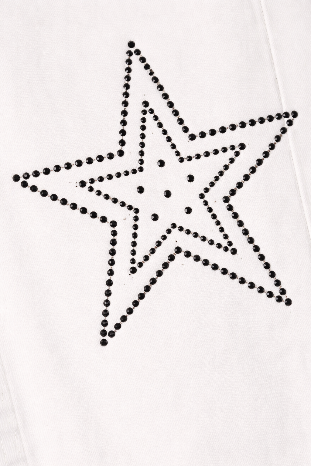 Star-shaped design with black rhinestones on a white background